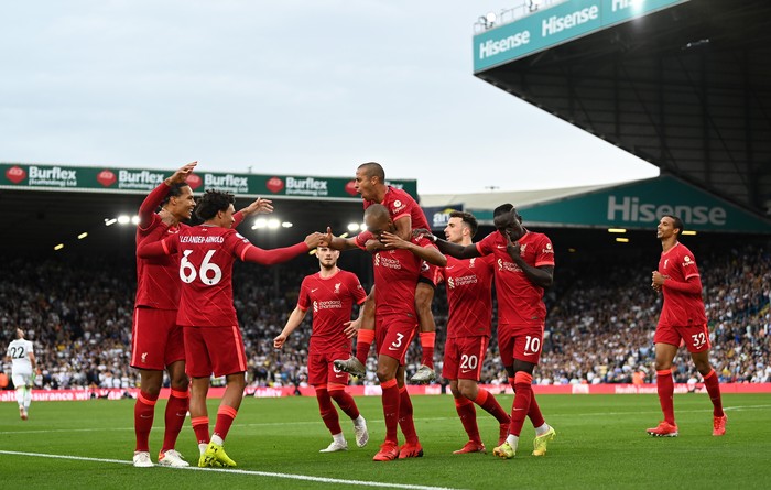 LEEDS, ENGLAND - SEPTEMBER 12: Fabinho of Liverpool celebrates with Thiago Alcantara and team mates after scoring their sides second goal during the Premier League match between Leeds United and Liverpool at Elland Road on September 12, 2021 in Leeds, England. (Photo by Shaun Botterill/Getty Images)