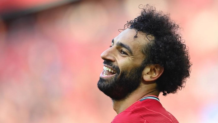 LIVERPOOL, ENGLAND - AUGUST 28: Mohamed Salah of Liverpool smiles during the Premier League match between Liverpool  and  Chelsea at Anfield on August 28, 2021 in Liverpool, England. (Photo by Michael Regan/Getty Images)