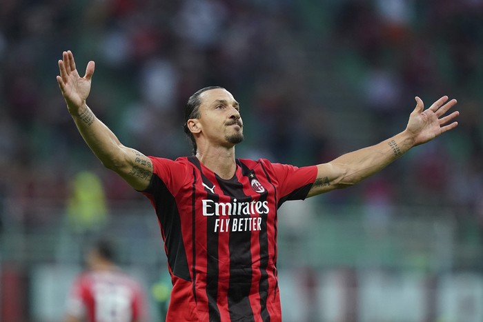 Milans Zlatan Ibrahimovic celebrates after scoring  his sides seconf goal during the Italian Serie A soccer match between Milan and Lazio at the San Siro stadium in Milan, Italy, Sunday, Sept. 12, 2021. (Spada/LaPresse via AP)