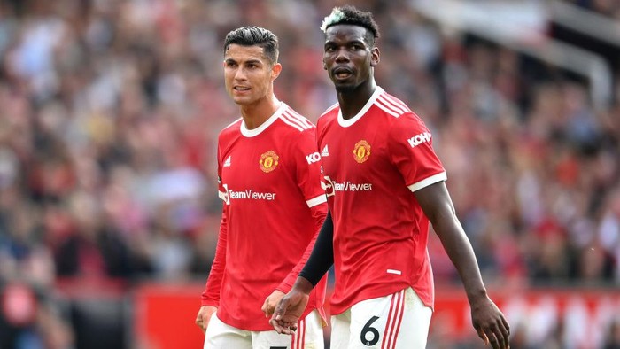 MANCHESTER, ENGLAND - SEPTEMBER 11: Cristiano Ronaldo and Paul Pogba of Manchester United look on during the Premier League match between Manchester United and Newcastle United at Old Trafford on September 11, 2021 in Manchester, England. (Photo by Laurence Griffiths/Getty Images)
