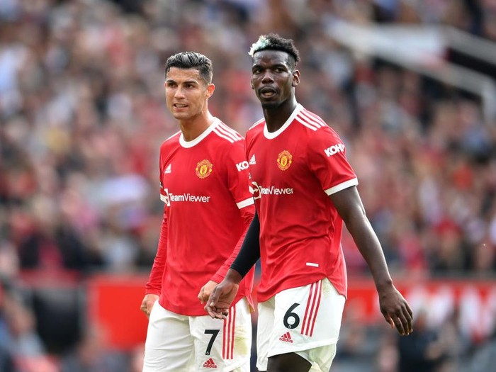 MANCHESTER, ENGLAND - SEPTEMBER 11: Cristiano Ronaldo and Paul Pogba of Manchester United look on during the Premier League match between Manchester United and Newcastle United at Old Trafford on September 11, 2021 in Manchester, England. (Photo by Laurence Griffiths/Getty Images)