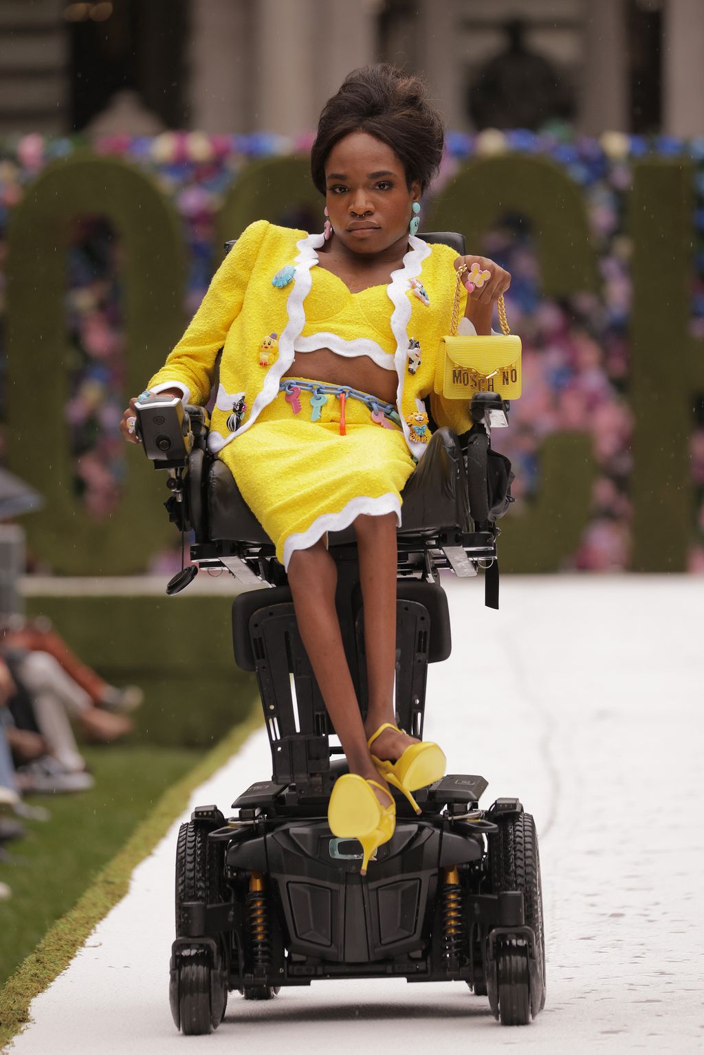 NEW YORK, NEW YORK - SEPTEMBER 09: Model Aaron Philip is seen wearing a Moschino dress outside the Moschino show during New York Fashion Week S/S 22 on September 09, 2021 in New York City. (Photo by Daniel Zuchnik/Getty Images)