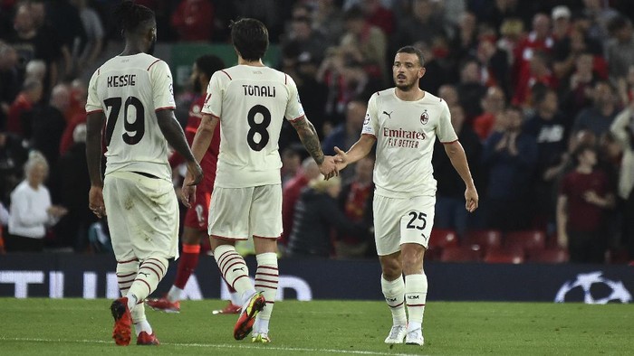 AC Milans Alessandro Florenzi, right, reacts at the end of the Champions League Group B soccer match between Liverpool and AC Milan at Anfield, in Liverpool, England, Wednesday Sept. 15, 2021. Liverpool won the match 3-2. (AP Photo/Rui Vieira)