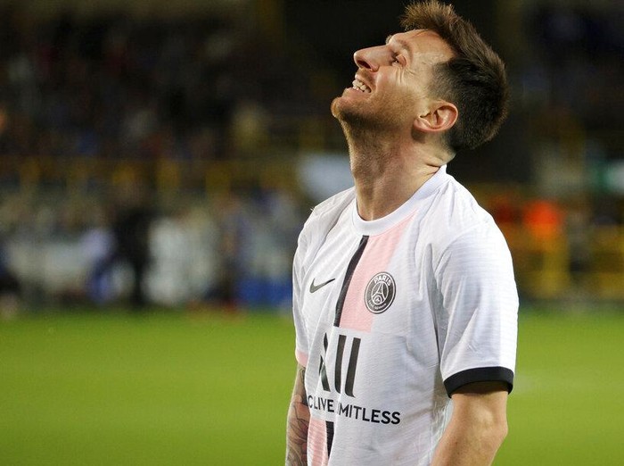 PSG's Lionel Messi reacts during the Champions League Group A soccer match between Club Brugge and PSG at the Jan Breydel stadium in Bruges, Belgium, Wednesday, Sept. 15, 2021. (AP Photo/Olivier Matthys)