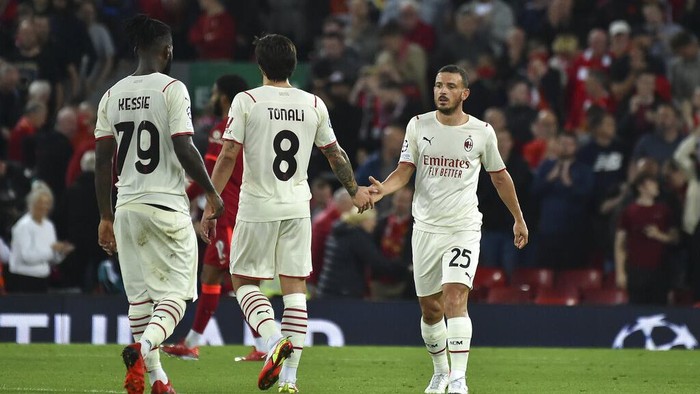 AC Milans Alessandro Florenzi, right, reacts at the end of the Champions League Group B soccer match between Liverpool and AC Milan at Anfield, in Liverpool, England, Wednesday Sept. 15, 2021. Liverpool won the match 3-2. (AP Photo/Rui Vieira)
