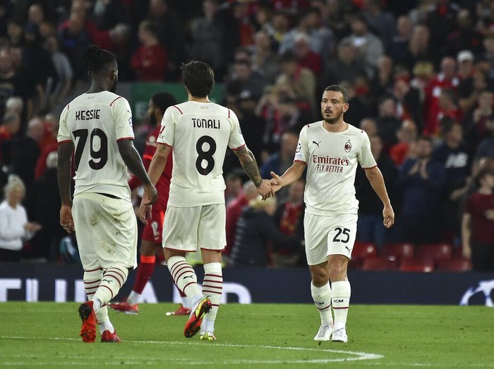 AC Milans Alessandro Florenzi, right, reacts at the end of the Champions League Group B soccer match between Liverpool and AC Milan at Anfield, in Liverpool, England, Wednesday Sept. 15, 2021. Liverpool won the match 3-2. (AP Photo/Rui Vieira)