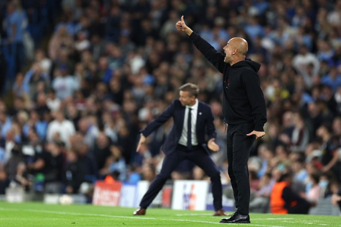 MANCHESTER, ENGLAND - SEPTEMBER 15: Pep Guardiola, Manager of Manchester City reacts during the UEFA Champions League group A match between Manchester City and RB Leipzig at Etihad Stadium on September 15, 2021 in Manchester, England. (Photo by Richard Heathcote/Getty Images)