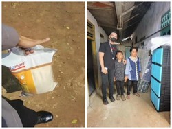 Mulia! Polisi Ini Beri Bantuan Sembako untuk Pedagang Kerupuk Tunanetra