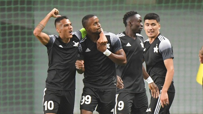 Sheriffs Momo Yansane, second right, celebrates after scoring his sides second goal during the Champions League Group D soccer match between FC Sheriff Tiraspol and Shakhtar Donetsk in Tiraspol, Moldova, Wednesday, Sept. 15, 2021. (AP Photo/str)