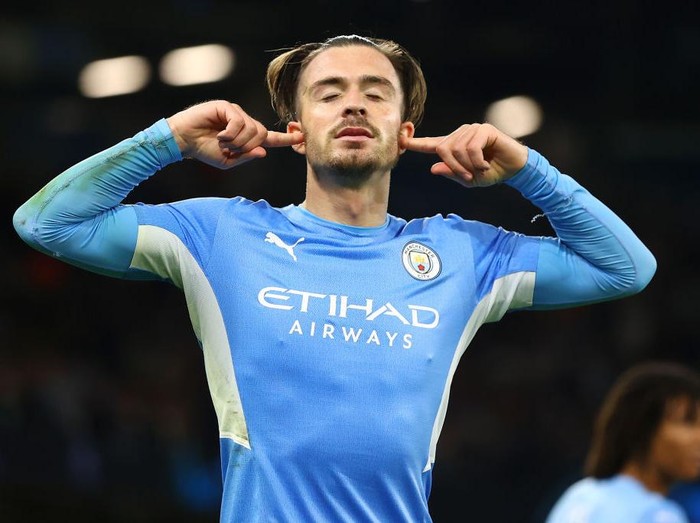 MANCHESTER, ENGLAND - SEPTEMBER 15: Jack Grealish of Manchester City celebrates after scoring their side's fourth goal during the UEFA Champions League group A match between Manchester City and RB Leipzig at Etihad Stadium on September 15, 2021 in Manchester, England. (Photo by Michael Steele/Getty Images)