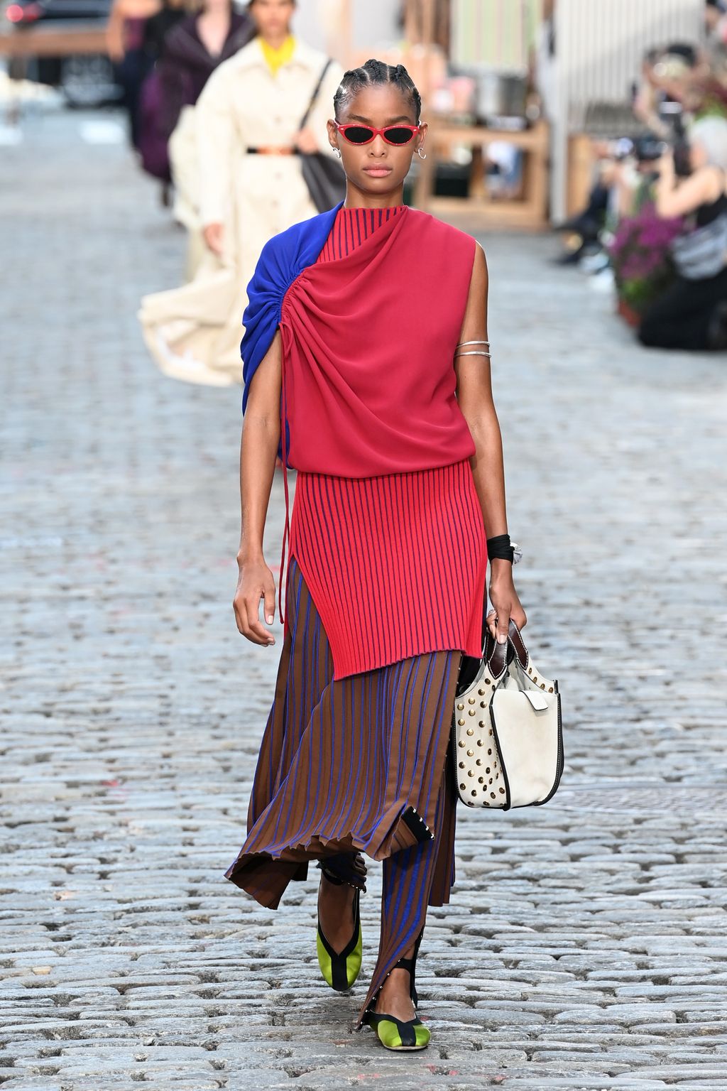 NEW YORK, NEW YORK - SEPTEMBER 12: A model walks the runway during the Tory Burch Spring/Summer 2022 Collection & Mercer Street Block Party on September 12, 2021 in New York City. (Photo by Slaven Vlasic/Getty Images for Tory Burch)
