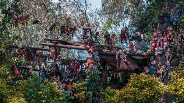 Mexico city, August, 28, 2018: Famous and unique island full of tetric dolls in Xochimilco.