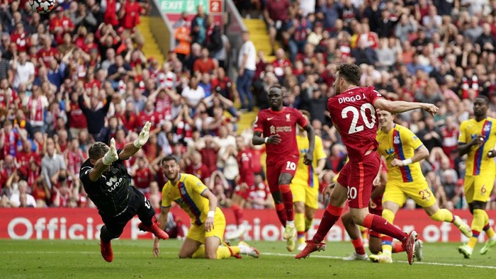 Liverpools Diogo Jota, foreground right, shoots over the bar from close range during the English Premier League soccer match between Liverpool and Crystal Palace at Anfield Stadium, Liverpool, England, Saturday Sep. 18, 2021. (AP Photo/Jon Super)