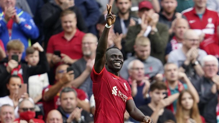Liverpools Sadio Mane celebrates after scoring the opening goal during the English Premier League soccer match between Liverpool and Crystal Palace at Anfield Stadium, Liverpool, England, Saturday Sep. 18, 2021. (AP Photo/Jon Super)