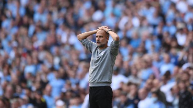 MANCHESTER, ENGLAND - SEPTEMBER 18: Pep Guardiola, Manager of Manchester City reacts during the Premier League match between Manchester City and Southampton at Etihad Stadium on September 18, 2021 in Manchester, England. (Photo by Laurence Griffiths/Getty Images)