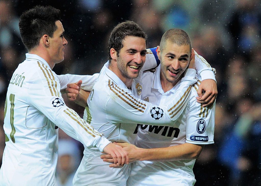 MADRID, SPAIN - APRIL 18:  Gonzalo Higuain of Real Madrid celebrates with Cristiano Ronaldo after scoring Real's first goal during the La Liga match between Real Madrid and Valencia at Estadio Santiago Bernabeu on April 18, 2010 in Madrid, Spain.  (Photo by Denis Doyle/Getty Images)