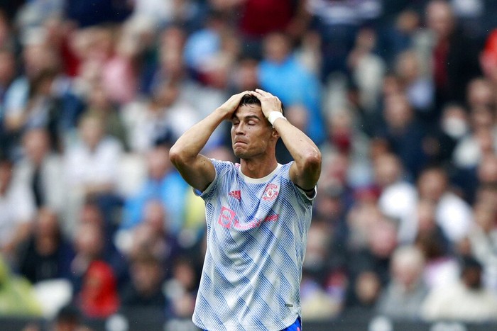 Manchester Uniteds Cristiano Ronaldo reacts after he failed to score a goal during the English Premier League soccer match between West Ham United and Manchester United at the London Stadium in London, England, Sunday, Sept. 19, 2021. (AP Photo/Ian Walton)