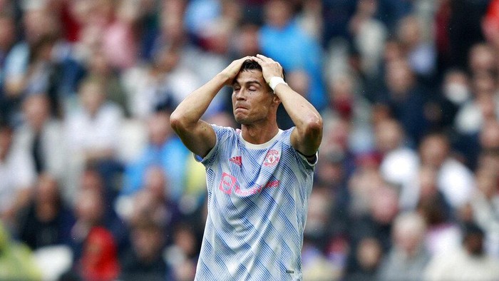 Manchester Uniteds Cristiano Ronaldo reacts after he failed to score a goal during the English Premier League soccer match between West Ham United and Manchester United at the London Stadium in London, England, Sunday, Sept. 19, 2021. (AP Photo/Ian Walton)