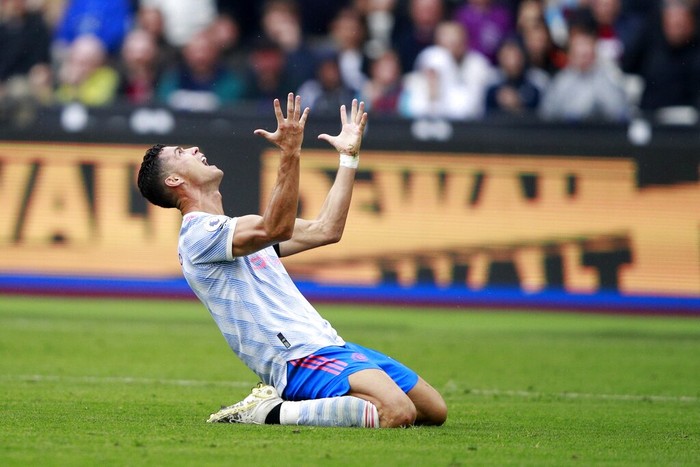 Manchester Uniteds Cristiano Ronaldo reacts after he failed to score a goal during the English Premier League soccer match between West Ham United and Manchester United at the London Stadium in London, England, Sunday, Sept. 19, 2021. (AP Photo/Ian Walton)