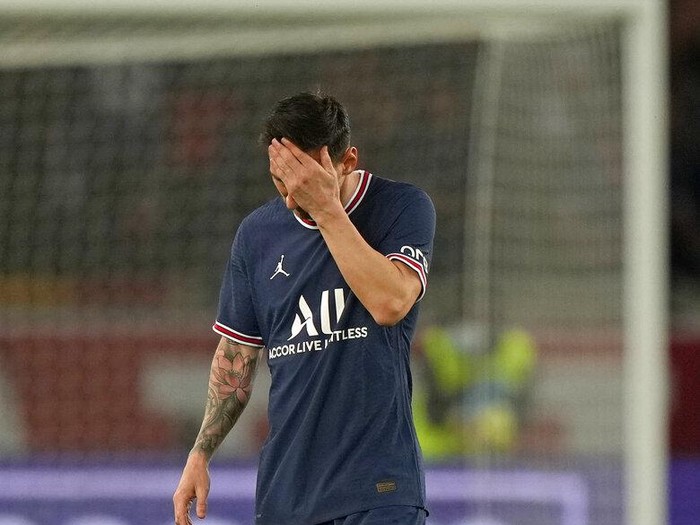 PSGs Lionel Messi reacts after Lyons Lucas Paqueta scored the opening goal during the French League One soccer match between Paris Saint-Germain and Lyon at the Parc des Princes in Paris Sunday, Sept. 19, 2021. (AP Photo/Francois Mori)