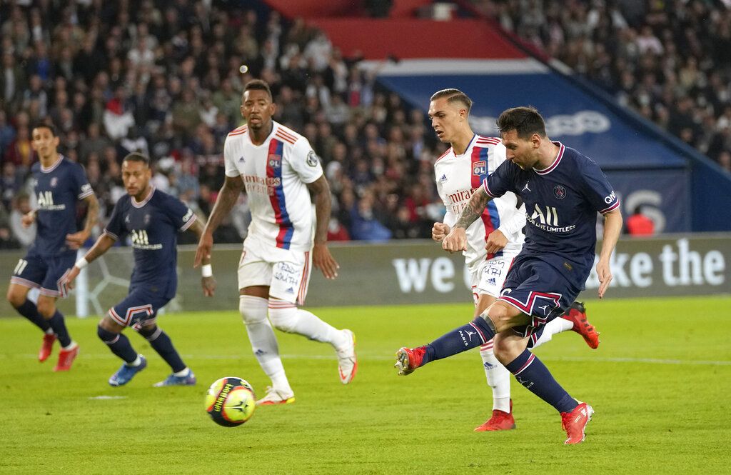 PSG's Lionel Messi reacts after Lyon's Lucas Paqueta scored the opening goal during the French League One soccer match between Paris Saint-Germain and Lyon at the Parc des Princes in Paris Sunday, Sept. 19, 2021. (AP Photo/Francois Mori)