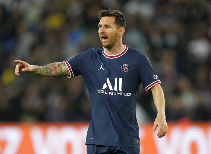 PSGs Lionel Messi reacts after Lyons Lucas Paqueta scored the opening goal during the French League One soccer match between Paris Saint-Germain and Lyon at the Parc des Princes in Paris Sunday, Sept. 19, 2021. (AP Photo/Francois Mori)