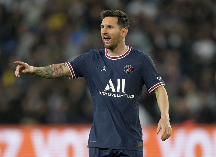 PSG's Lionel Messi looks down after he was substituted during the French League One soccer match between Paris Saint-Germain and Lyon at the Parc des Princes in Paris Sunday, Sept. 19, 2021. (AP Photo/Francois Mori)