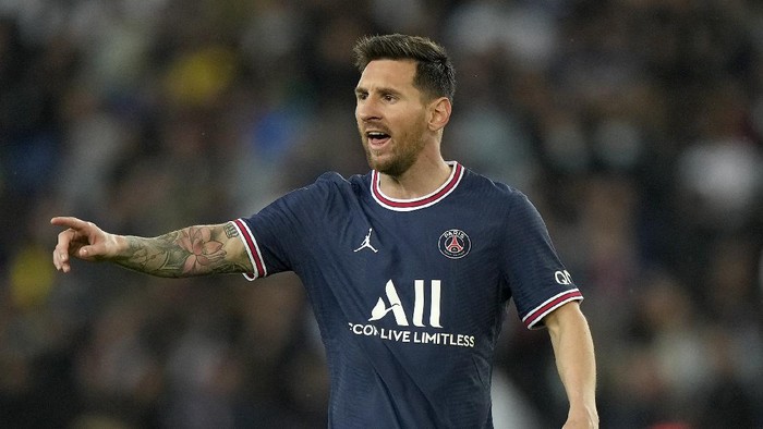 PSGs Lionel Messi looks down after he was substituted during the French League One soccer match between Paris Saint-Germain and Lyon at the Parc des Princes in Paris Sunday, Sept. 19, 2021. (AP Photo/Francois Mori)
