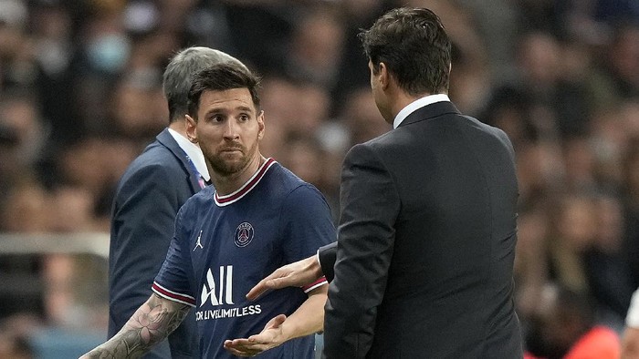 PSGs Lionel Messi looks down after he was substituted during the French League One soccer match between Paris Saint-Germain and Lyon at the Parc des Princes in Paris Sunday, Sept. 19, 2021. (AP Photo/Francois Mori)