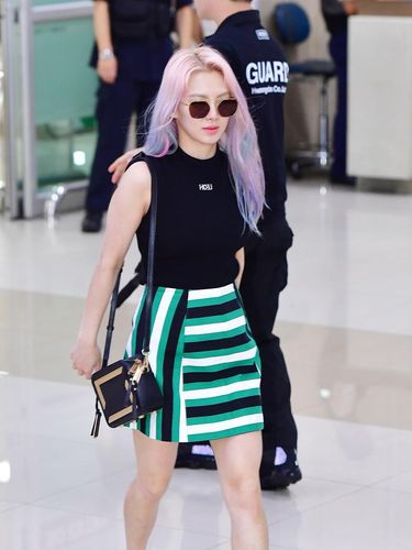 Happy Birthday to SNSD's Hyoyeon!  Take a peek at some of the best airport fashion styles