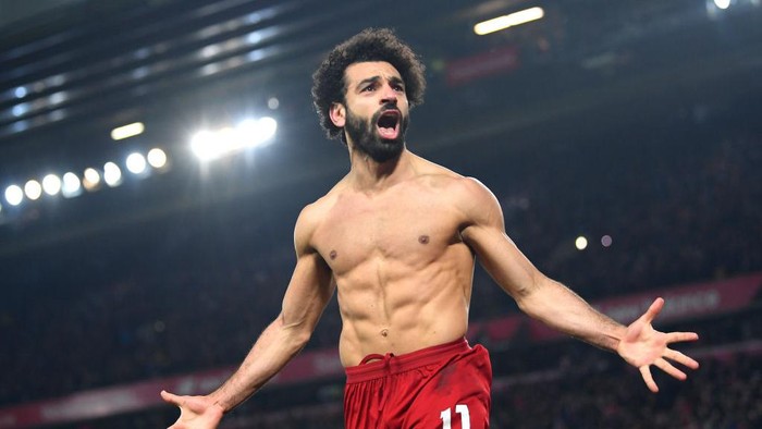 LIVERPOOL, ENGLAND - JANUARY 19: Mohamed Salah of Liverpool celebrates after scoring his teams second goal during the Premier League match between Liverpool FC and Manchester United at Anfield on January 19, 2020 in Liverpool, United Kingdom. (Photo by Michael Regan/Getty Images)