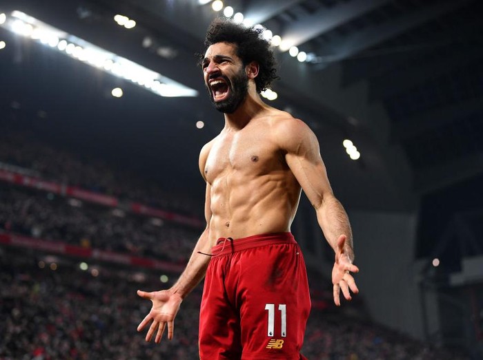 LIVERPOOL, ENGLAND - JANUARY 19: Mohamed Salah of Liverpool celebrates after scoring his team's second goal during the Premier League match between Liverpool FC and Manchester United at Anfield on January 19, 2020 in Liverpool, United Kingdom. (Photo by Michael Regan/Getty Images)