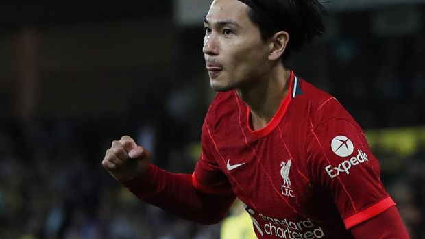 Soccer Football - Carabao Cup - Third Round - Norwich City v Liverpool - Carrow Road, Norwich, Britain - September 21, 2021 Liverpool's Takumi Minamino celebrates scoring their first goal Action Images via Reuters/Paul Childs EDITORIAL USE ONLY. No use with unauthorized audio, video, data, fixture lists, club/league logos or 'live' services. Online in-match use limited to 75 images, no video emulation. No use in betting, games or single club /league/player publications.  Please contact your account representative for further details.