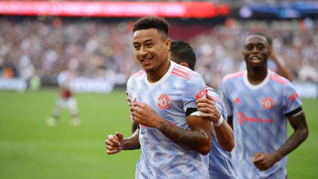 Soccer Football - Premier League - West Ham United v Manchester United - London Stadium, London, Britain - September 19, 2021 Manchester United's Jesse Lingard celebrates scoring their second goal REUTERS/David Klein EDITORIAL USE ONLY. No use with unauthorized audio, video, data, fixture lists, club/league logos or 'live' services. Online in-match use limited to 75 images, no video emulation. No use in betting, games or single club /league/player publications.  Please contact your account representative for further details.