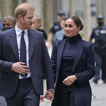 Meghan Markle and Prince Harry pause while getting a tour of the National September 11 Memorial & Museum in New York, Thursday, Sept. 23, 2021. The Duke and Duchess of Sussex got a hawk's-eye view of New York City with a visit to the rebuilt World Trade Center's signature tower. (AP Photo/Seth Wenig)