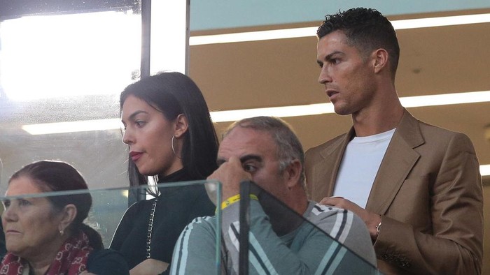 TURIN, ITALY - OCTOBER 02:  Cristiano Ronaldo and Georgina Rodriguez are seen during the Group H match of the UEFA Champions League between Juventus and BSC Young Boys at Allianz Stadium on October 2, 2018 in Turin, Italy.  (Photo by Emilio Andreoli/Getty Images)