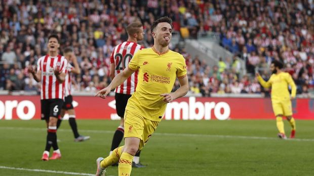 Soccer Football - Premier League - Brentford v Liverpool - Brentford Community Stadium, London, Britain - September 25, 2021  Liverpool's Diogo Jota celebrates scoring their first goal Action Images via Reuters/Matthew Childs EDITORIAL USE ONLY. No use with unauthorized audio, video, data, fixture lists, club/league logos or 'live' services. Online in-match use limited to 75 images, no video emulation. No use in betting, games or single club /league/player publications.  Please contact your account representative for further details.