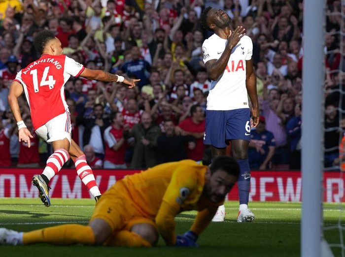 Arsenal's manager Mikel Arteta gestures during the English Premier League soccer match between Arsenal and Tottenham Hotspur at the Emirates stadium in London, Sunday, Sept. 26, 2021. (AP Photo/Frank Augstein)