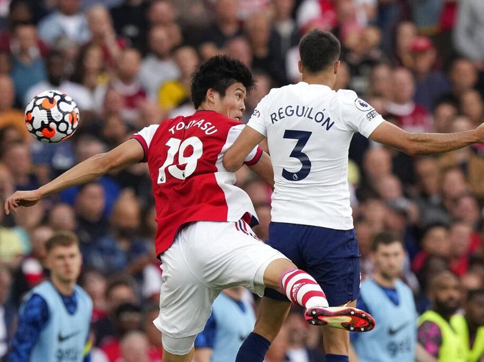 Arsenal's manager Mikel Arteta gestures during the English Premier League soccer match between Arsenal and Tottenham Hotspur at the Emirates stadium in London, Sunday, Sept. 26, 2021. (AP Photo/Frank Augstein)