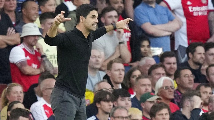 Arsenal's manager Mikel Arteta gestures during the English Premier League soccer match between Arsenal and Tottenham Hotspur at the Emirates stadium in London, Sunday, Sept. 26, 2021. (AP Photo/Frank Augstein)