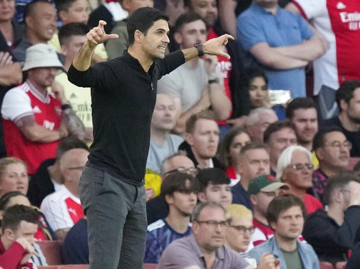 Arsenal's manager Mikel Arteta gestures during the English Premier League soccer match between Arsenal and Tottenham Hotspur at the Emirates stadium in London, Sunday, Sept. 26, 2021. (AP Photo/Frank Augstein)