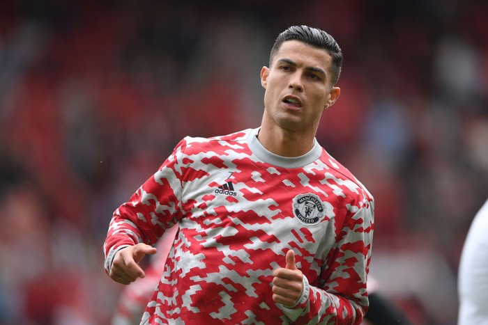 MANCHESTER, ENGLAND - SEPTEMBER 11: Cristiano Ronaldo of Manchester United warms up prior to the Premier League match between Manchester United and Newcastle United at Old Trafford on September 11, 2021 in Manchester, England. (Photo by Laurence Griffiths/Getty Images)