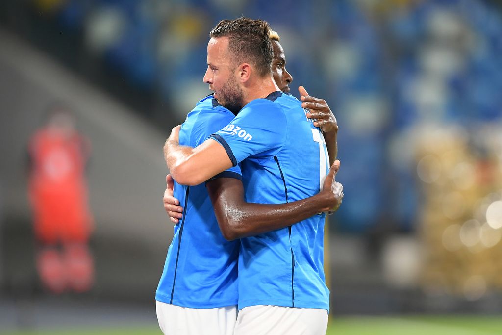 NAPLES, ITALY - SEPTEMBER 26: Amir Rrahmani and Victor Osimhen of SSC Napoli celebrate the 1-0 goal scored by Victor Osimhen during the Serie A match between SSC Napoli and Cagliari Calcio at Stadio Diego Armando Maradona on September 26, 2021 in Naples, Italy. (Photo by Francesco Pecoraro/Getty Images)