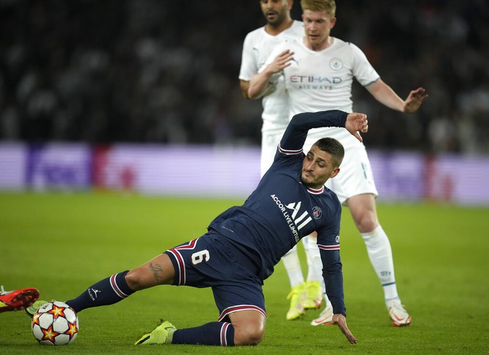 PSGs Marco Verratti kicks the ball during the Champions League Group A soccer match between Paris Saint-Germain and Manchester City at the Parc des Princes in Paris, Tuesday, Sept. 28, 2021. (AP Photo/Christophe Ena)