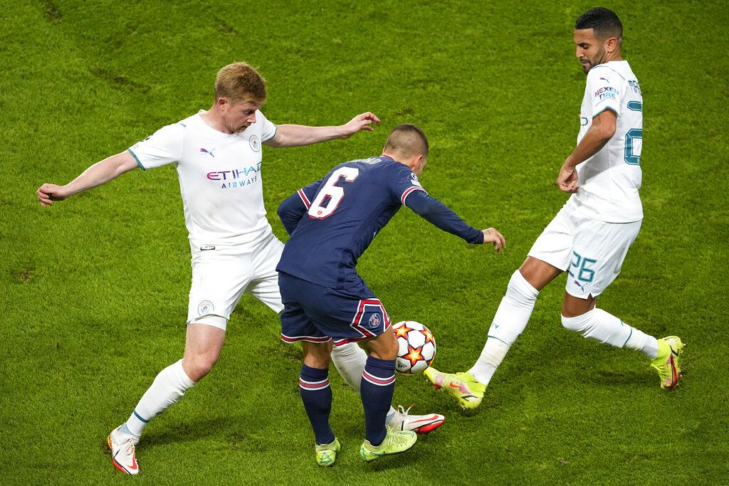 PSG's Marco Verratti kicks the ball during the Champions League Group A soccer match between Paris Saint-Germain and Manchester City at the Parc des Princes in Paris, Tuesday, Sept. 28, 2021. (AP Photo/Christophe Ena)