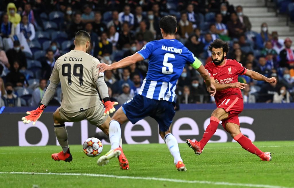 PORTO, PORTUGAL - SEPTEMBER 28: Mohamed Salah of Liverpool celebrates after scoring their sides third goal during the UEFA Champions League group B match between FC Porto and Liverpool FC at Estadio do Dragao on September 28, 2021 in Porto, Portugal. (Photo by David Ramos/Getty Images)