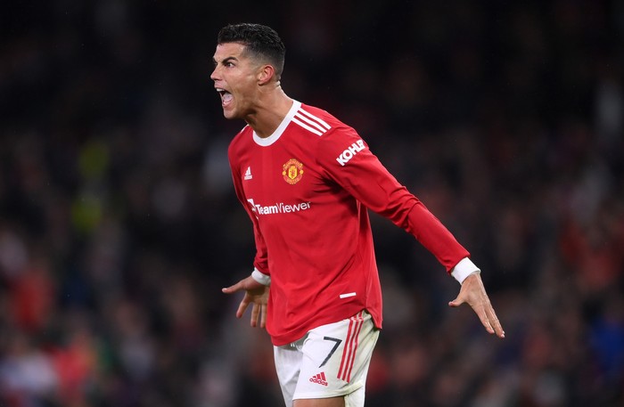 MANCHESTER, ENGLAND - SEPTEMBER 29: Cristiano Ronaldo of Manchester United celebrates their sides victory after the UEFA Champions League group F match between Manchester United and Villarreal CF at Old Trafford on September 29, 2021 in Manchester, England. (Photo by Laurence Griffiths/Getty Images)