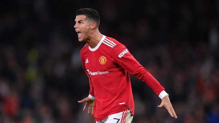 MANCHESTER, ENGLAND - SEPTEMBER 29: Cristiano Ronaldo of Manchester United celebrates their sides victory after the UEFA Champions League group F match between Manchester United and Villarreal CF at Old Trafford on September 29, 2021 in Manchester, England. (Photo by Laurence Griffiths/Getty Images)