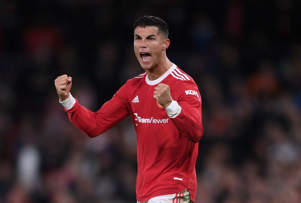 MANCHESTER, ENGLAND - SEPTEMBER 29: Cristiano Ronaldo of Manchester United celebrates their side's victory after the UEFA Champions League group F match between Manchester United and Villarreal CF at Old Trafford on September 29, 2021 in Manchester, England. (Photo by Laurence Griffiths/Getty Images)