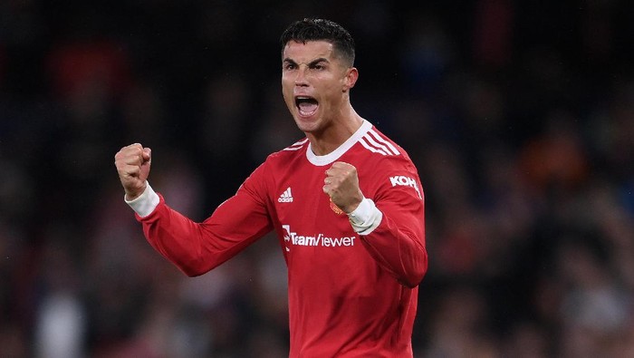 MANCHESTER, ENGLAND - SEPTEMBER 29: Cristiano Ronaldo of Manchester United celebrates their sides victory after the UEFA Champions League group F match between Manchester United and Villarreal CF at Old Trafford on September 29, 2021 in Manchester, England. (Photo by Laurence Griffiths/Getty Images)